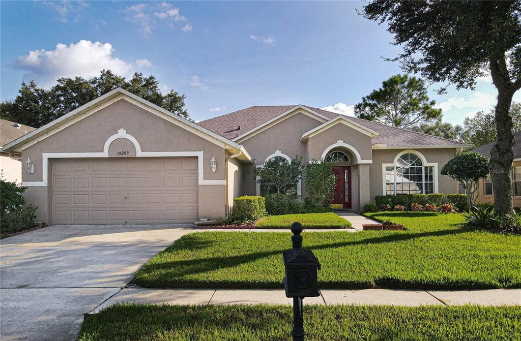 19209 DOVE CREEK DRIVE TAMPA, FL 33647