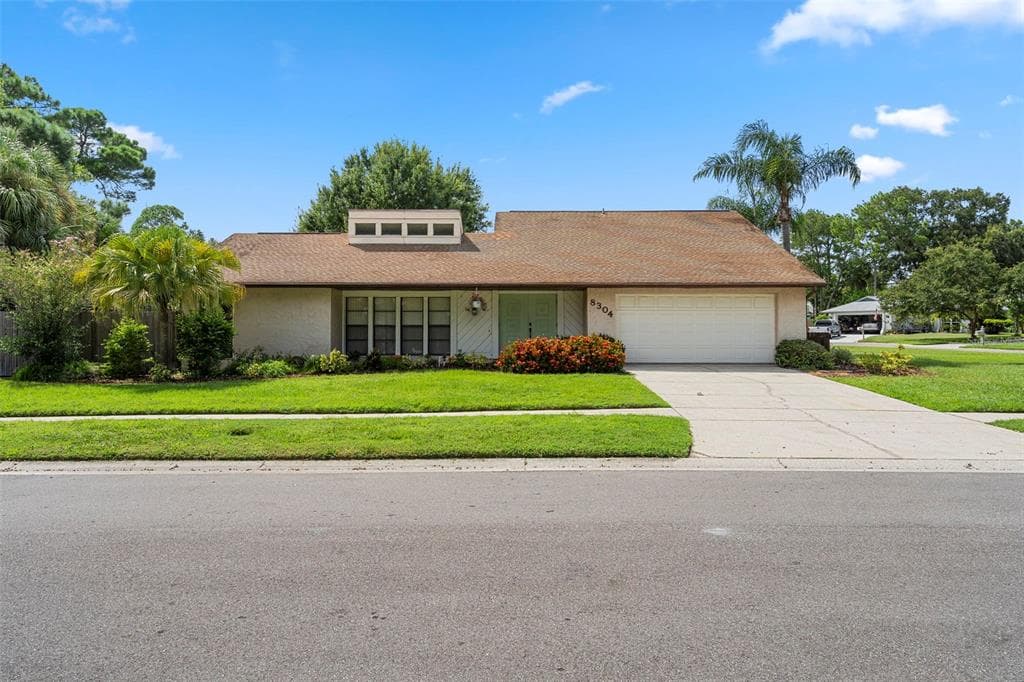 8304 LAGO VISTA DRIVE