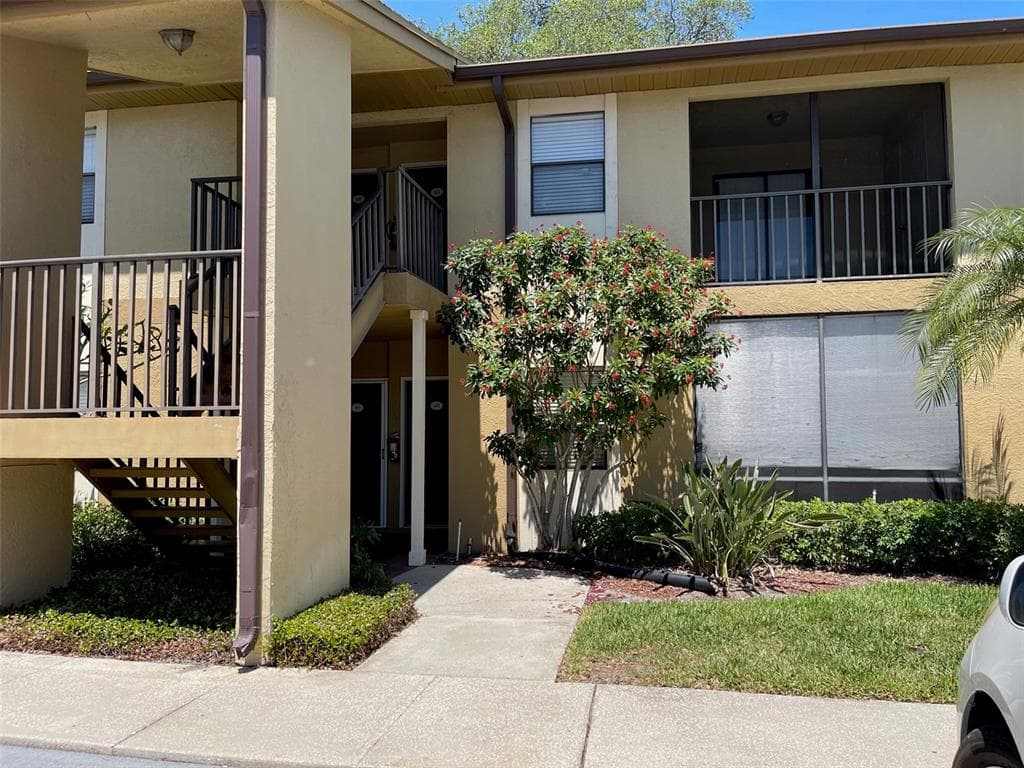 10167 SAILWINDS BOULEVARD N UNIT 202