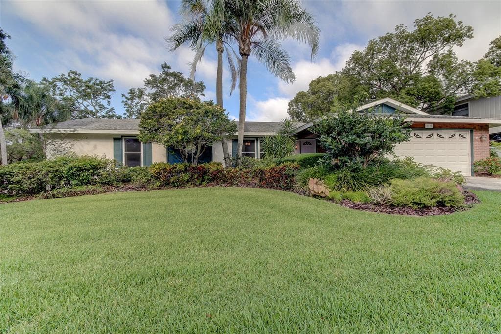 1212 ROLLINGWOOD DRIVE TARPON SPRINGS, FL 34689