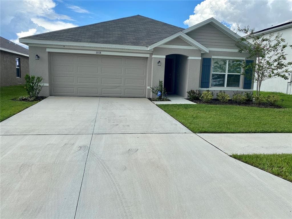 1018 SWAYING SAWGRASS AVENUE RUSKIN, FL 33570