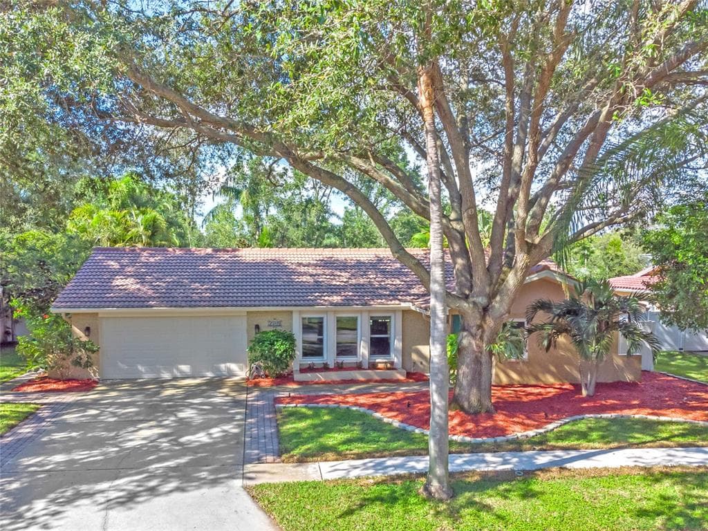 1889 MOURNING DOVE DRIVE PALM HARBOR, FL 34683