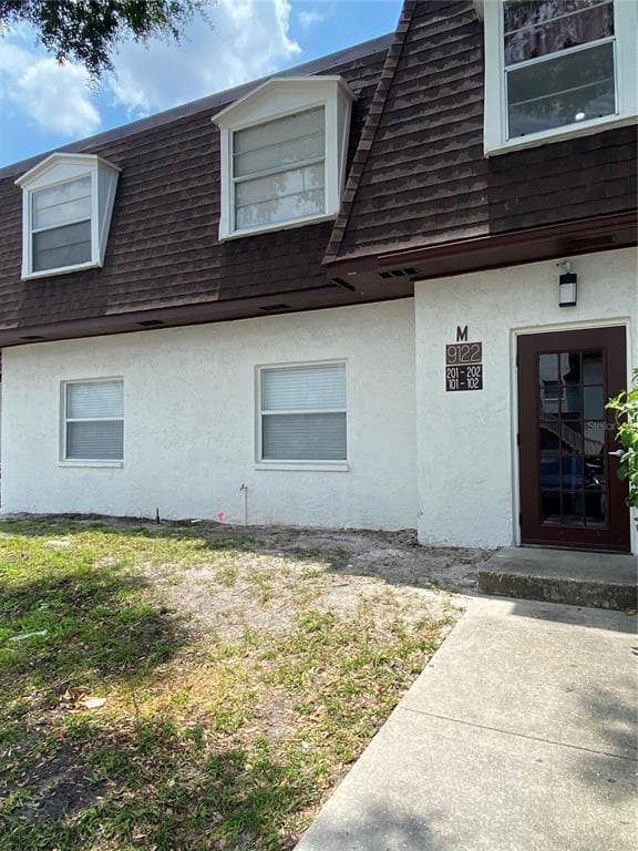 9122 TUDOR DRIVE UNIT M101 TAMPA, FL 33615