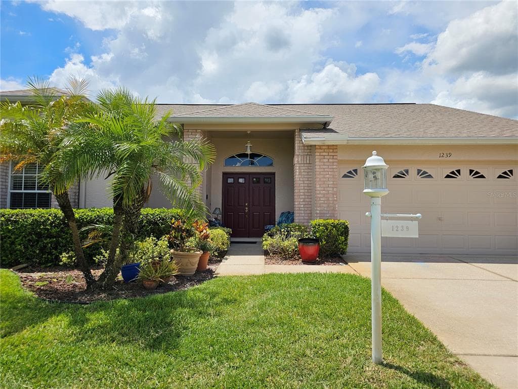 1239 SWEET JASMINE DRIVE TRINITY, FL 34655