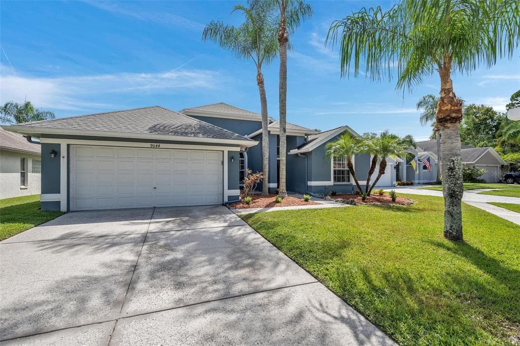 9044 BRELAND DRIVE TAMPA, FL 33626