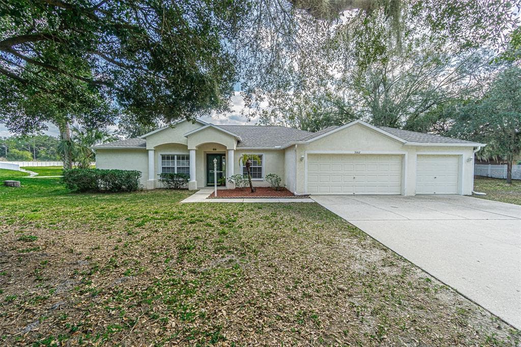 9302 BARRINGTON OAKS DRIVE