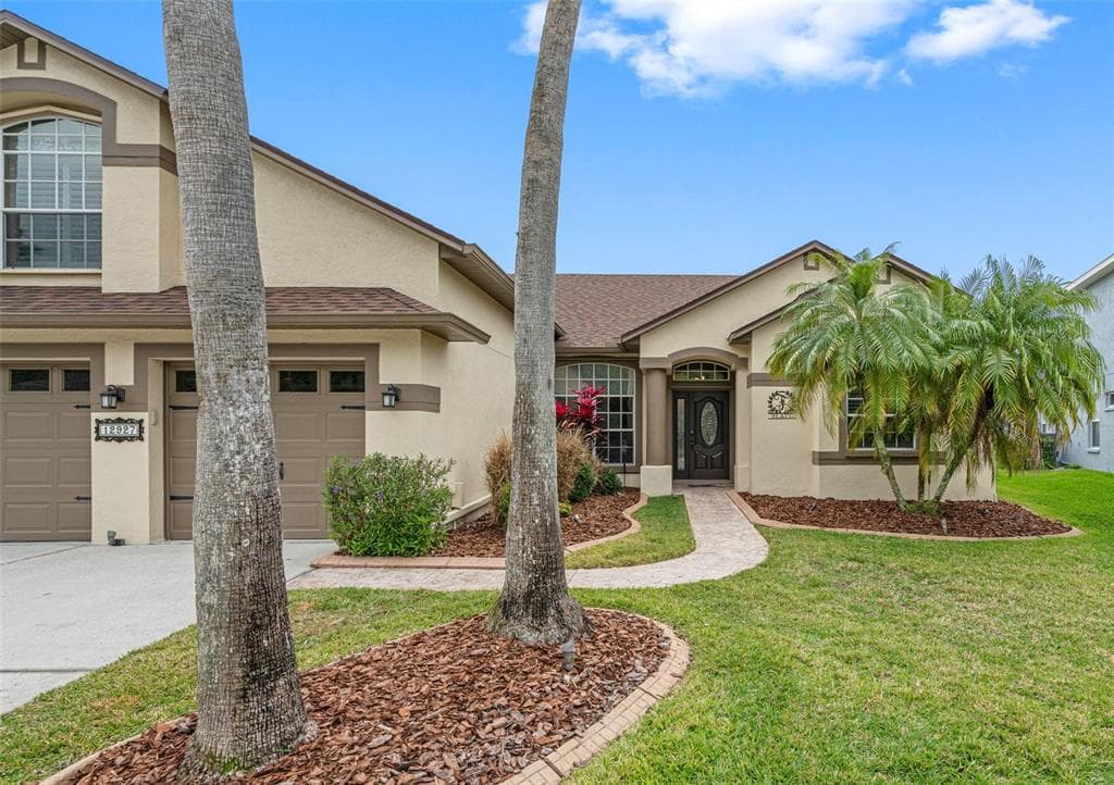 12927 TAR FLOWER DRIVE TAMPA, FL 33626