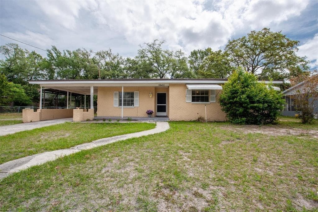 10411 N HARTTS DRIVE TAMPA, FL 33617