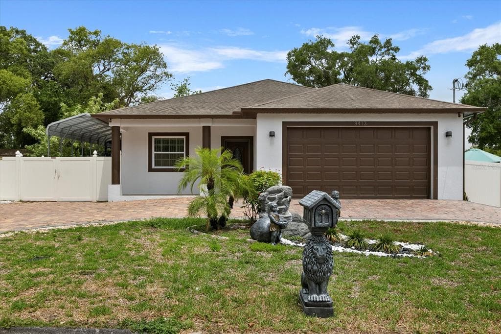 8413 N OLA AVENUE TAMPA, FL 33604