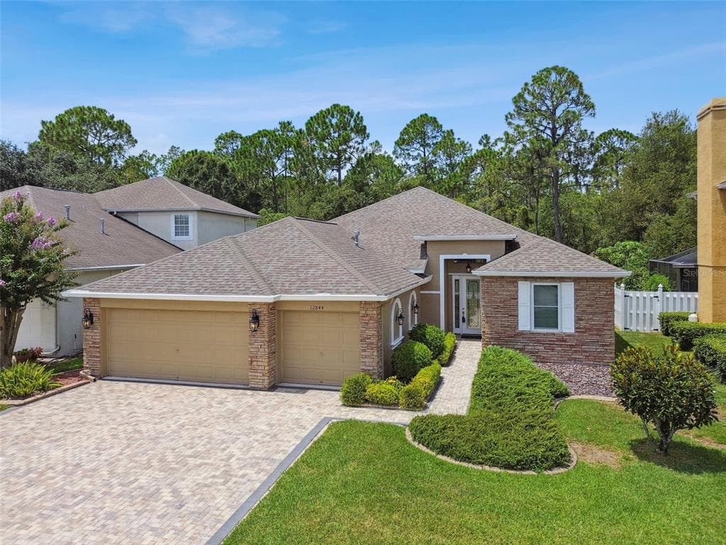 12844 TAR FLOWER DRIVE TAMPA, FL 33626