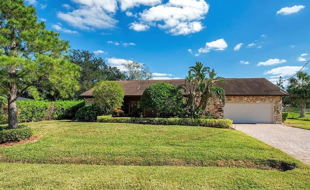 12011 N GOMEZ AVENUE TAMPA, FL 33618