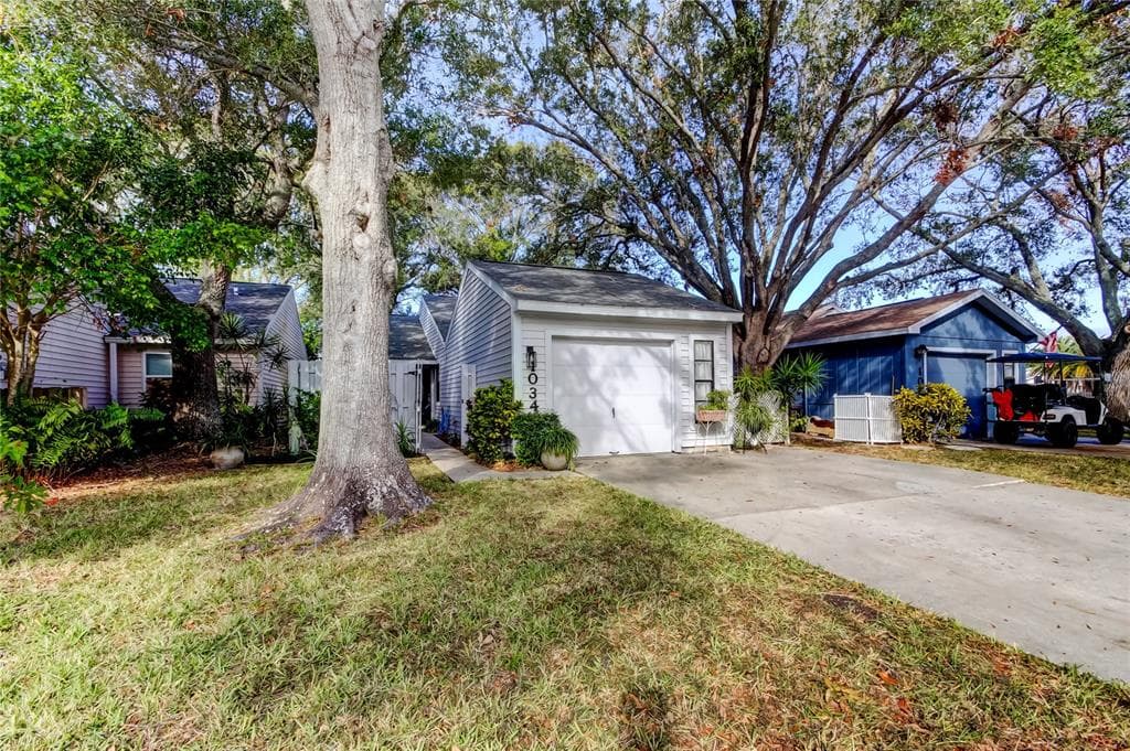 1034 WILLOWOOD LANE DUNEDIN, FL 34698