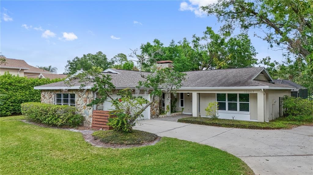 13307 MEADOWWOOD COURT TAMPA, FL 33618
