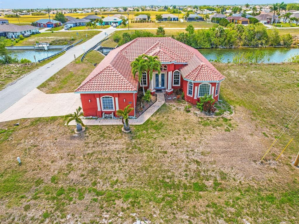 1112 NW 9TH AVENUE CAPE CORAL, FL 33993