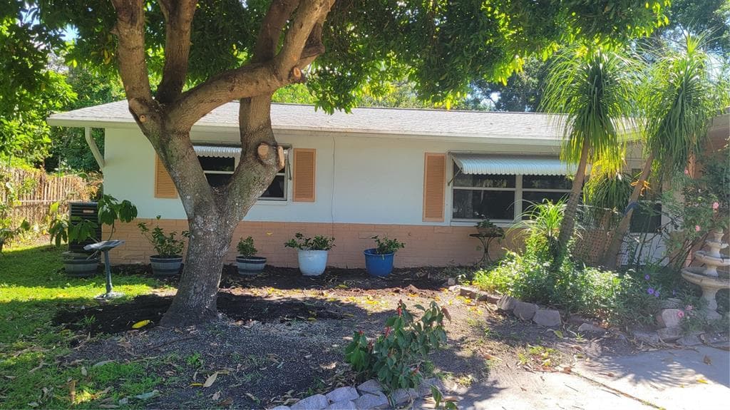 1421 HEATHER DRIVE DUNEDIN, FL 34698
