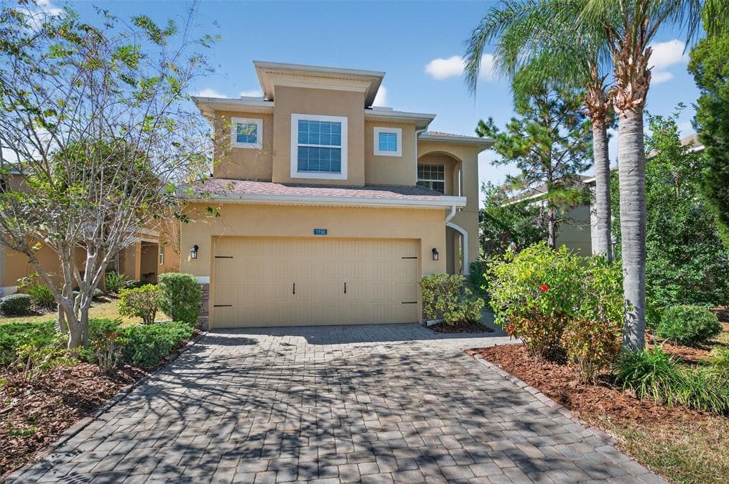 7710 TUSCANY WOODS DRIVE