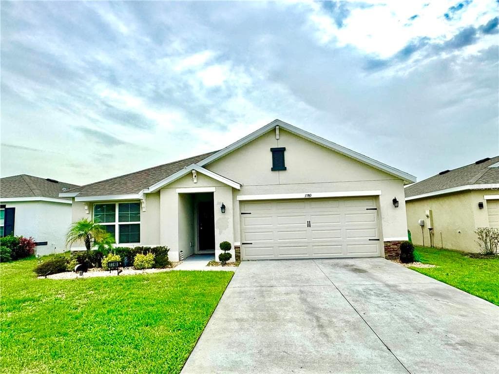 7749 BROAD POINT DRIVE ZEPHYRHILLS, FL 33540