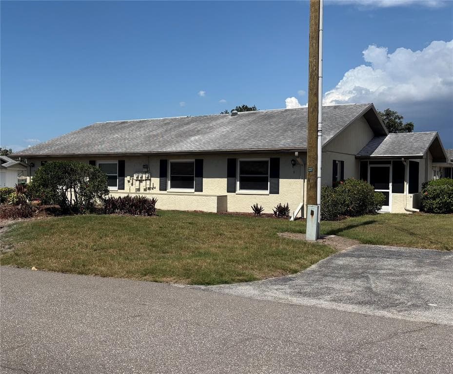 1905 CANTERBURY LANE UNIT E-9 SUN CITY CENTER, FL 33573
