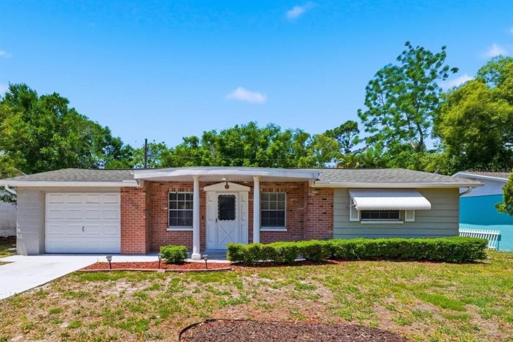 3303 WILLIAMSBURG LOOP HOLIDAY, FL 34691