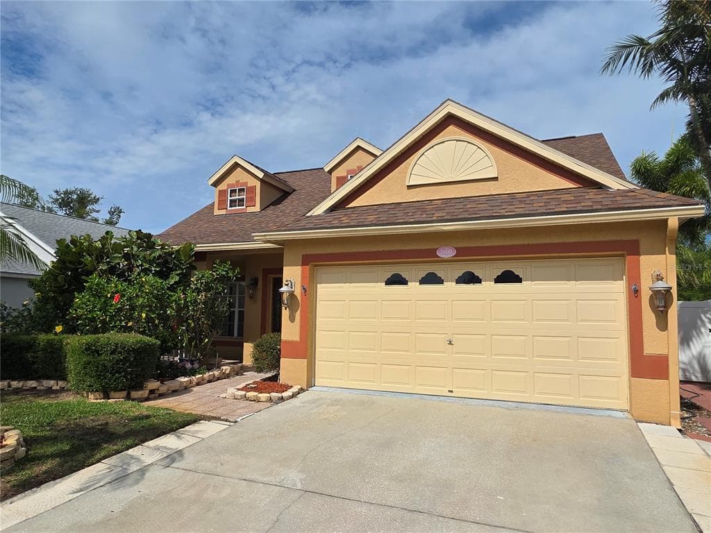 1690 MEADOW OAK LANE TARPON SPRINGS, FL 34689