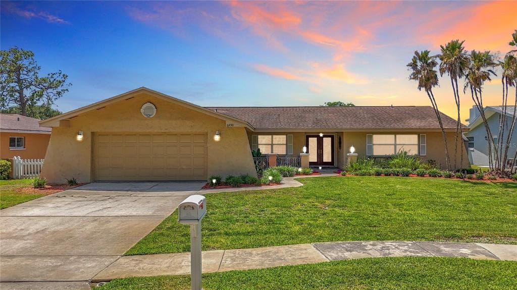6490 BURNING TREE DRIVE