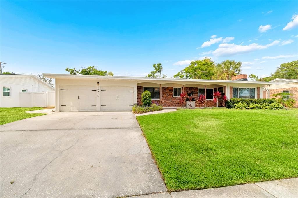 10916 CARROLLWOOD DRIVE TAMPA, FL 33618