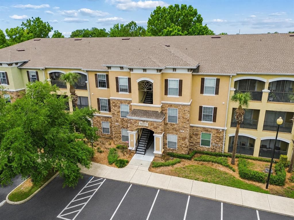 10203 COURTNEY PALMS BOULEVARD UNIT 103