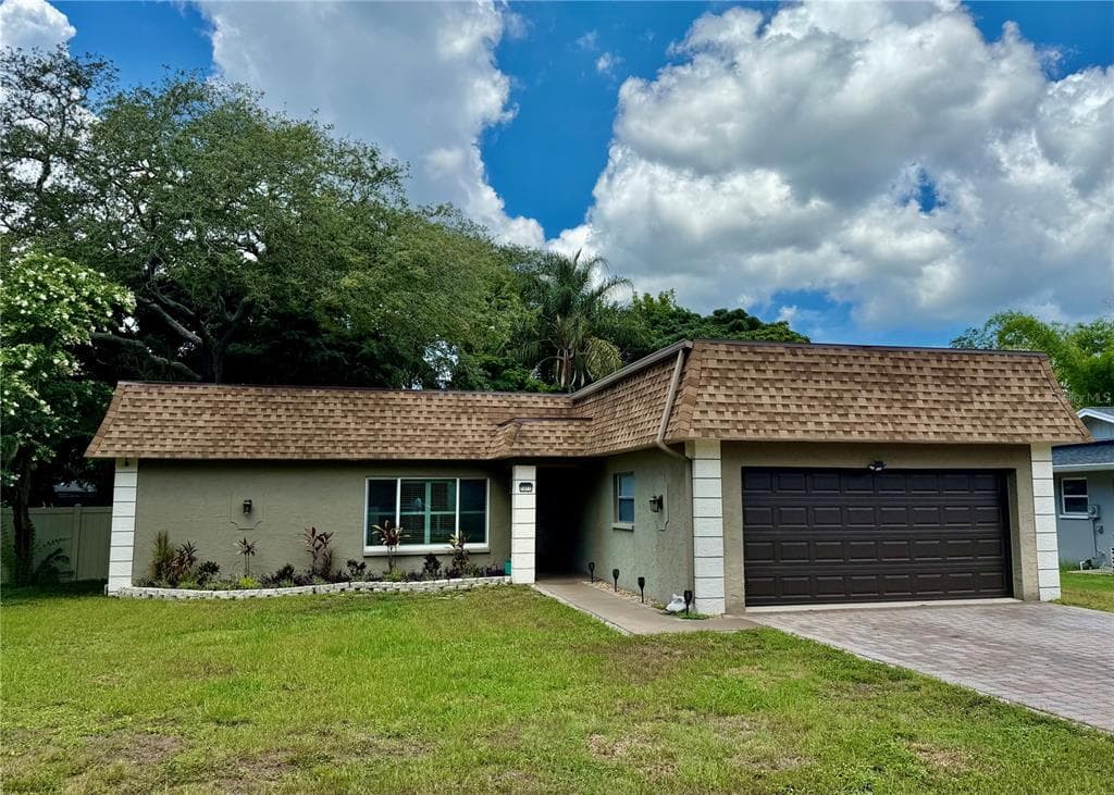 1011 WINDING OAKS DRIVE PALM HARBOR, FL 34683