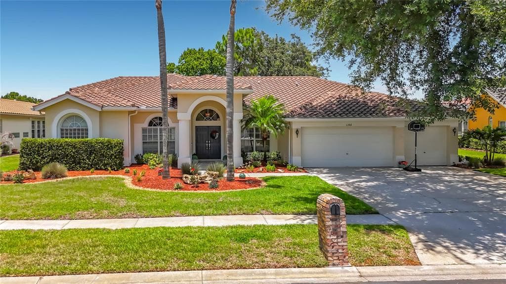 1266 BERKSHIRE LANE TARPON SPRINGS, FL 34688