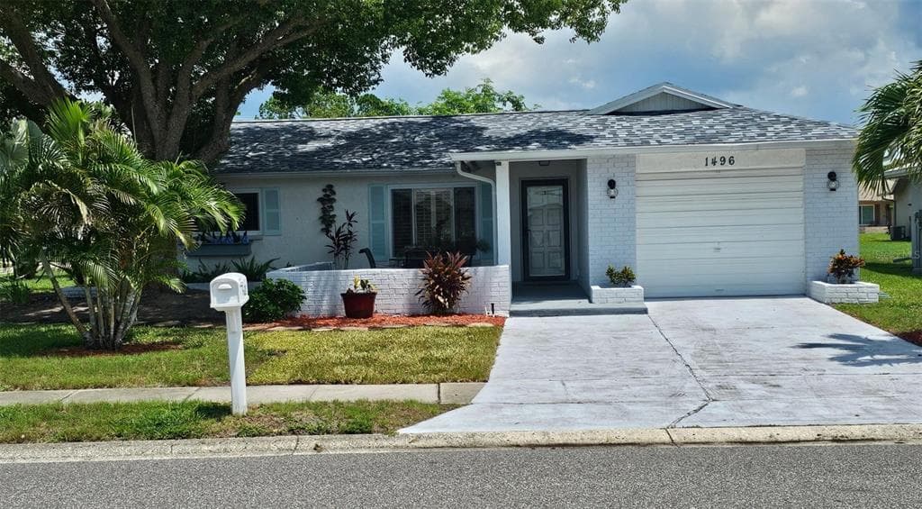 1496 QUEEN ANNE DRIVE PALM HARBOR, FL 34684
