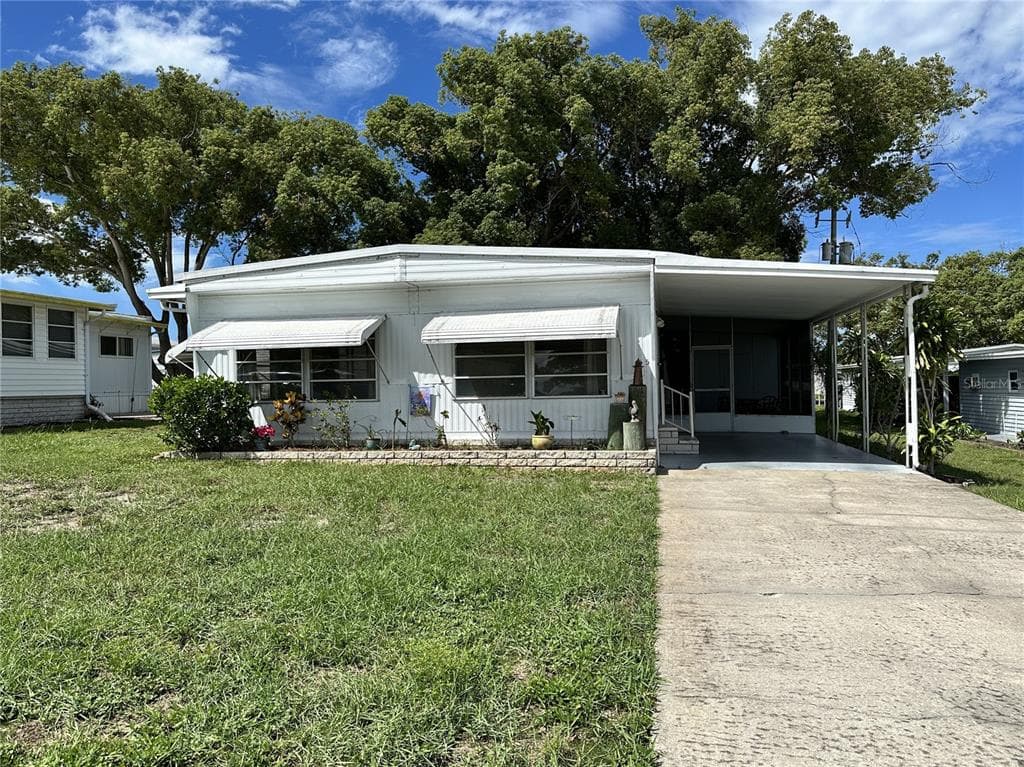 55 LEXINGTON COURT UNIT 12 PALM HARBOR, FL 34684