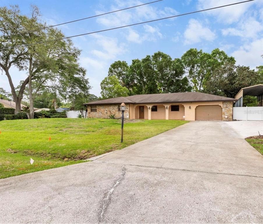 8210 WESTRIDGE DRIVE TAMPA, FL 33615