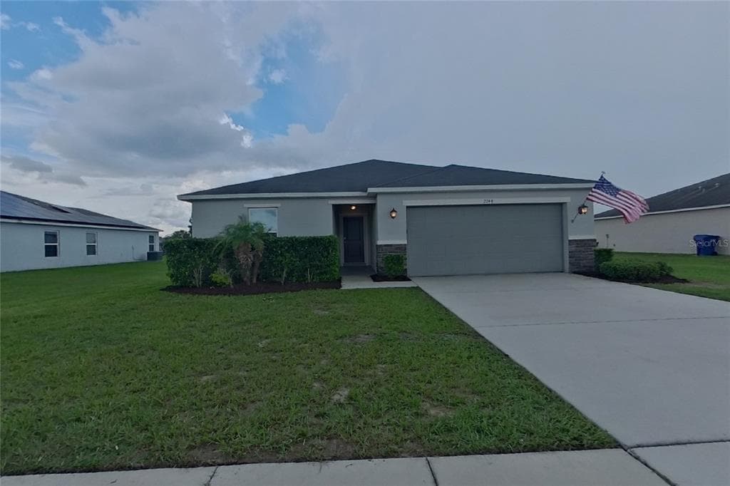 2244 GLADIOLUS LANE MASCOTTE, FL 34753