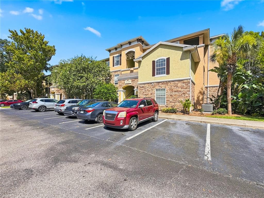 10209 COURTNEY PALMS BOULEVARD UNIT 203