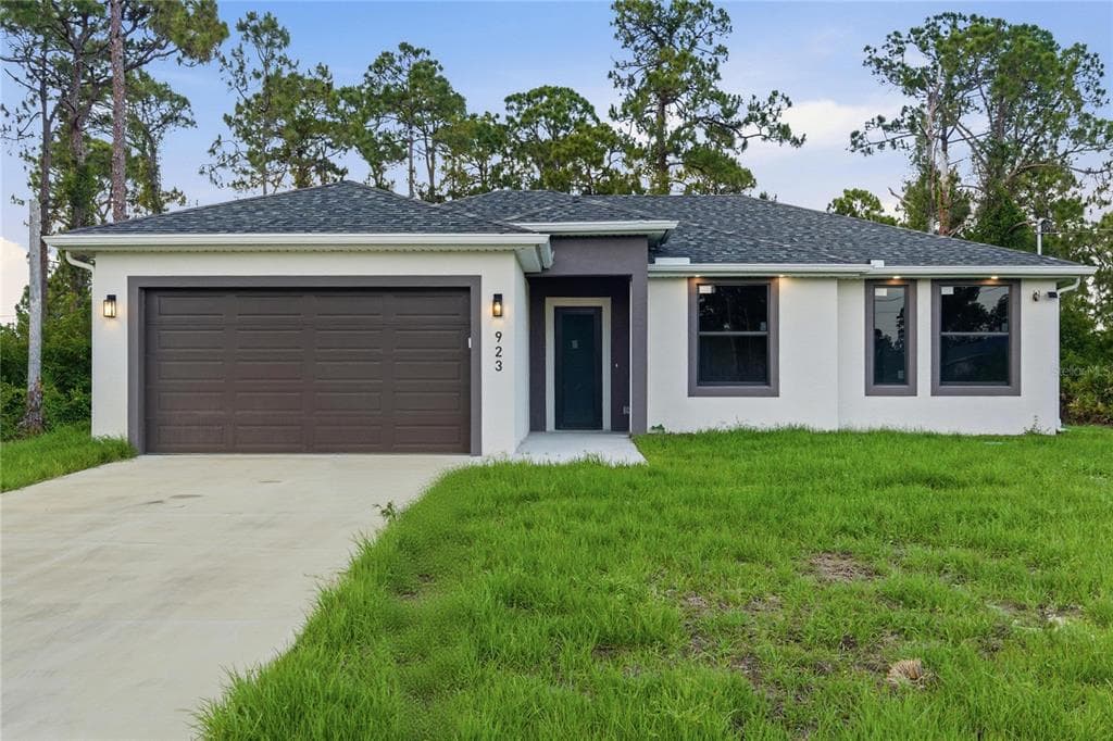 923 MILWAUKEE BOULEVARD LEHIGH ACRES, FL 33974