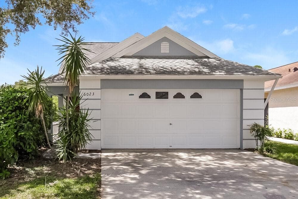 6023 SAND KEY LANE WESLEY CHAPEL, FL 33545
