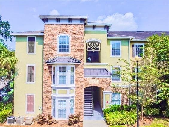 9918 COURTNEY PALMS BOULEVARD UNIT 103