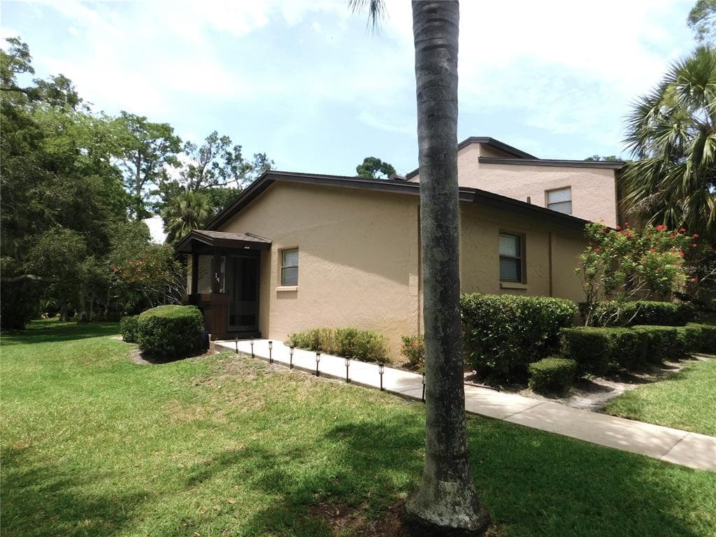 1400 TARPON WOODS BOULEVARD UNIT 1-4 PALM HARBOR, FL 34685