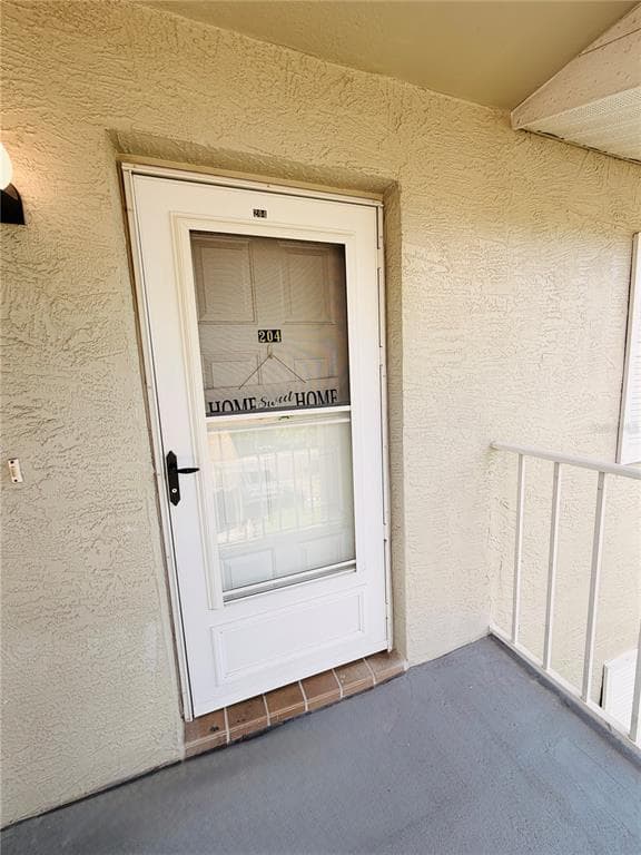 1435 MILLSTREAM LANE UNIT 204 DUNEDIN, FL 34698